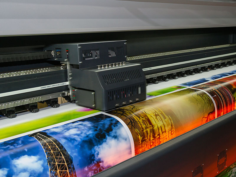 Large format printing machine in operation. Industry